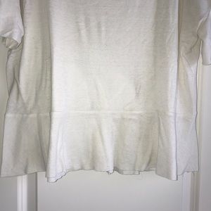 Cream colored, soft material shirt